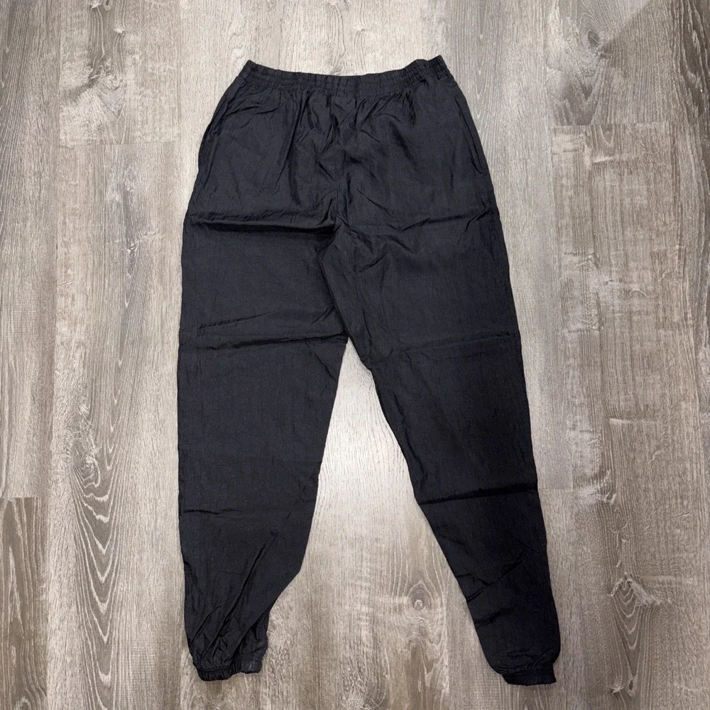 VTG Reebok Mens Track Pants Black Size Medium Elastic Waist Drawstring Nylon Zip